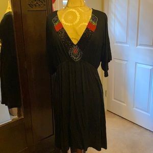 Black casual dress with beaded neckline